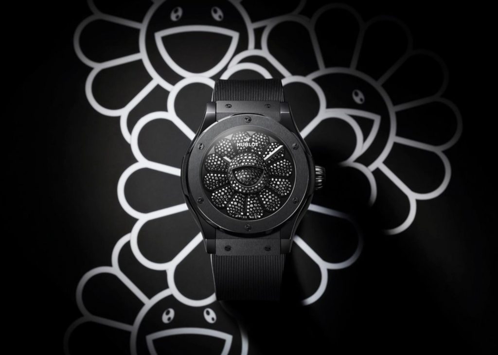 The black ceramic fake watch has a black dial.