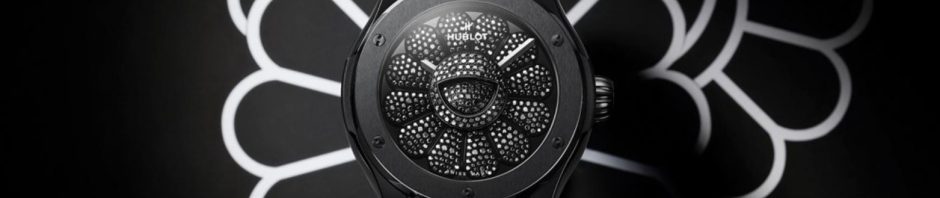 The black ceramic fake watch has a black dial.