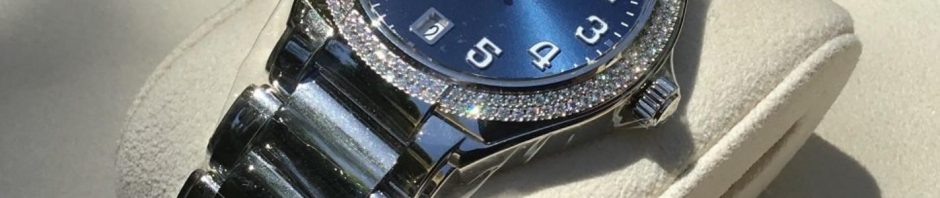 The blue dial fake watch is designed for women.